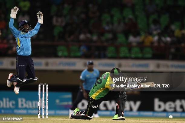 Niroshan Dickwella of Saint Lucia Kings appeals successfully for the wicket of Rovman Powell of Jamaica Tallawahs, LBW to Jeavor Royal of Saint Lucia...