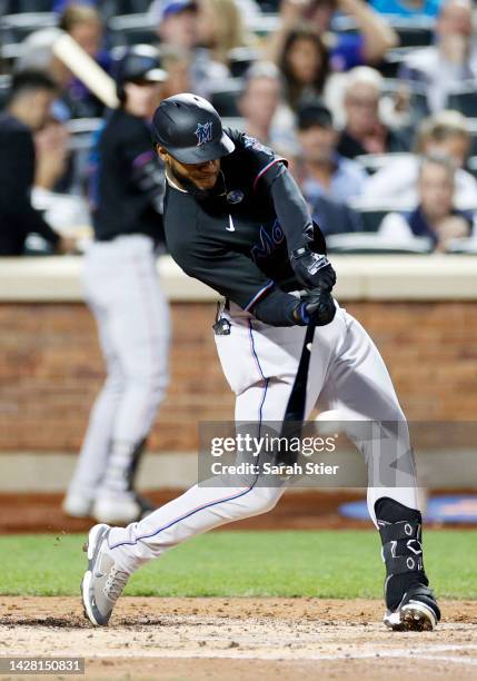 Bryan De La Cruz of the Miami Marlins doubles during the third inning against the New York Mets at Citi Field on September 27, 2022 in the Queens...