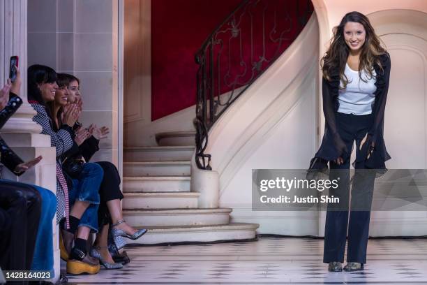 Designer Alice Vaillant salutes as guests applaud during the Vaillant Womenswear Spring/Summer 2023 show as part of Paris Fashion Week on September...