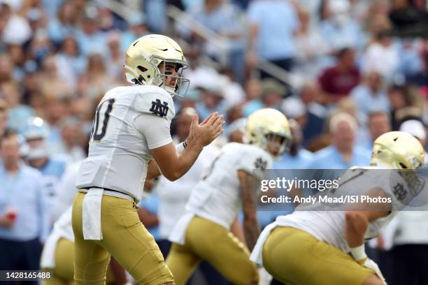 Drew Pyne of the University Notre Dame stands behind center during a game between Notre Dame and North Carolina at Kenan Memorial Stadium on...