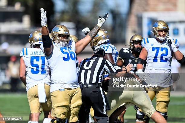 Offensive lineman Atonio Mafi of the UCLA Bruins reacts as a field goal attempt is good in the third quarter of a game against the Colorado Buffaloes...