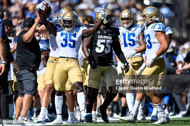 Linebacker Carl Jones Jr. #35 of the UCLA Bruins celebrates after intercepting a pass against the Colorado Buffaloes in the third quarter of a game...
