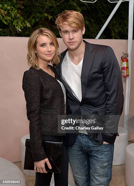 Actors Emma Roberts and Chord Overstreet attend the Conde Nast Traveler Hot List Party at the Hotel Bel-Air on April 12, 2012 in Los Angeles,...