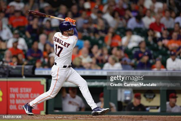 David Hensley of the Houston Astros hits an RBI single during the fifth inning against the Arizona Diamondbacks at Minute Maid Park on September 27,...