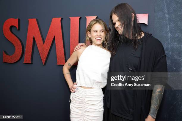 Sosie Bacon and Travis Bacon attend the Los Angeles screening of Paramount's "Smile" at Aero Theatre on September 27, 2022 in Santa Monica,...