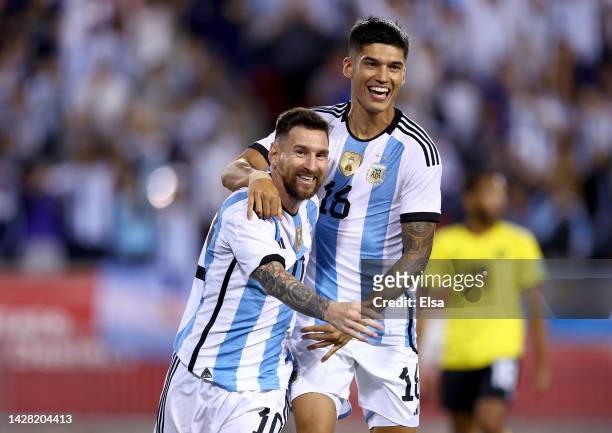 Lionel Messi of Argentina celebrates his goal with teammate Guido Rodríguez in the second half against Jamaica at Red Bull Arena on September 27,...
