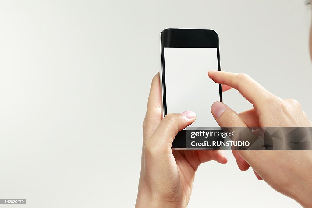 Business woman using digital phone,close-up