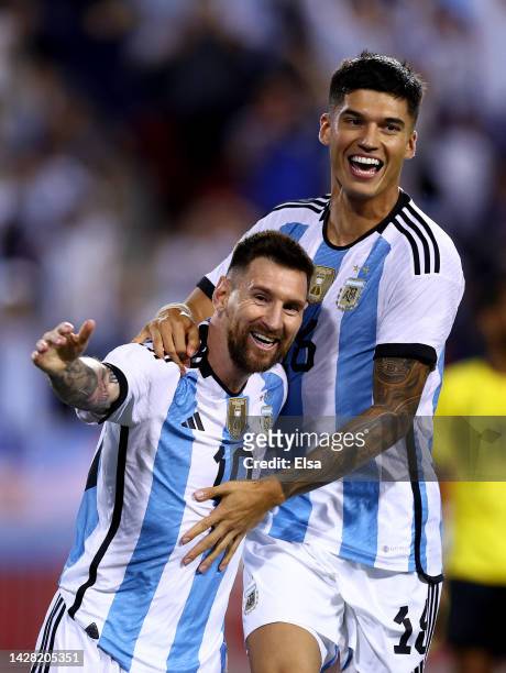 Lionel Messi of Argentina celebrates his goal with teammate Joaquin Correa in the second half against Jamaica at Red Bull Arena on September 27, 2022...