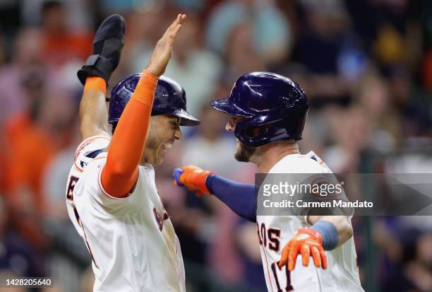 David Hensley of the Houston Astros high fives Jeremy Pena after hitting a two run home run during the sixth inning against the Arizona Diamondbacks...