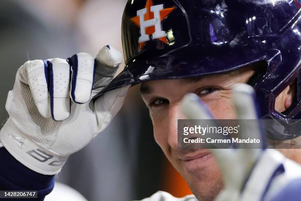 Alex Bregman of the Houston Astros reacts after hitting a solo home run during the sixth inning against the Arizona Diamondbacks at Minute Maid Park...