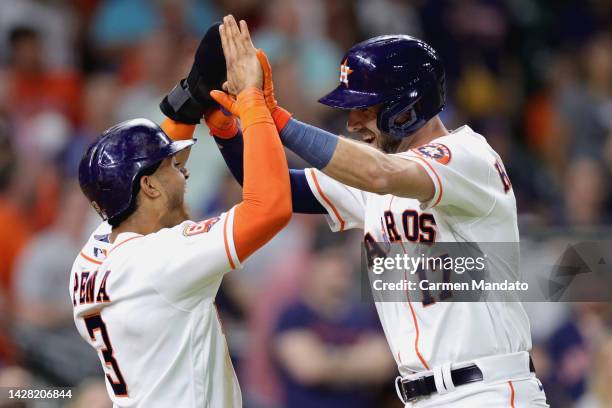 David Hensley of the Houston Astros high fives Jeremy Pena after hitting a two run home run during the sixth inning against the Arizona Diamondbacks...