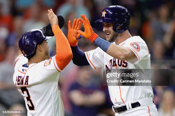 David Hensley of the Houston Astros high fives Jeremy Pena after hitting a two run home run during the sixth inning against the Arizona Diamondbacks...