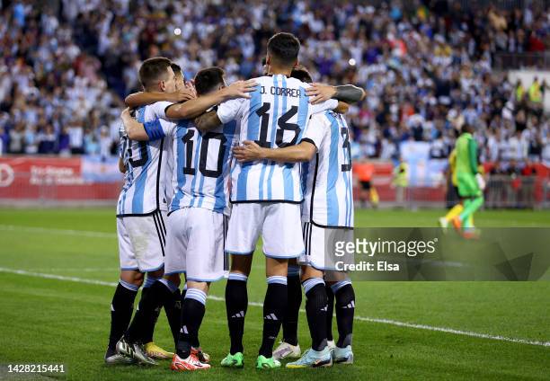 Lionel Messi of Argentina is congratulated by teammates after he scored in the second half against Jamaica at Red Bull Arena on September 27, 2022 in...
