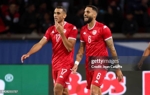 Ellyes Skhiri, Dylan Bronn of Tunisia celebrate their goal during the international friendly football match between Brazil and Tunisia at Parc des...