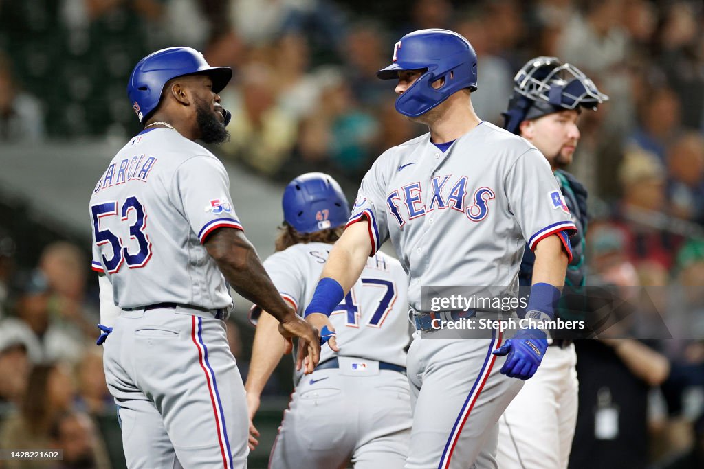 Seattle Rangers Josh Jung of the Texas Rangers celebrates his three-run home run with ...