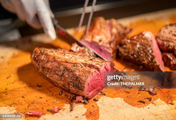 chef carving red meat - carving food stock pictures, royalty-free photos & images