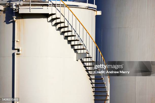 staircase on fuel storage tank - petrol price australia stock pictures, royalty-free photos & images