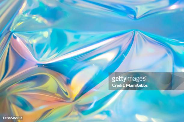 hologram sheet and reflected color - cr stock pictures, royalty-free photos & images