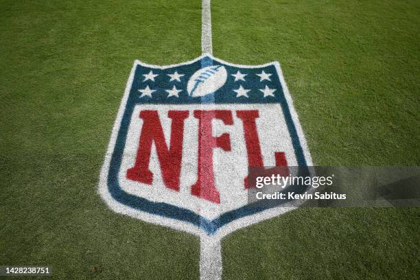 Detail shot of an NFL shield logo painted on the field prior to an NFL football game between the Las Vegas Raiders and Tennessee Titans at Nissan...