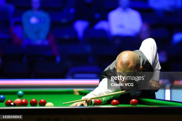 Barry Hawkins of England plays a shot in the first round match against Kyren Wilson of England on day one of the 2022 Cazoo British Open at Marshall...