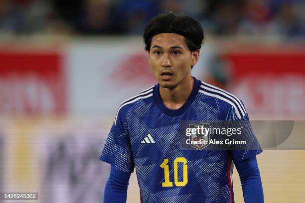 Takumi Minamino of Japan reacts during the international friendly match between Japan and Ecuador at Merkur Spiel Arena on September 27, 2022 in...