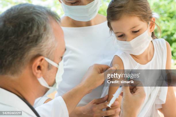 vaccination - polio virus stockfoto's en -beelden
