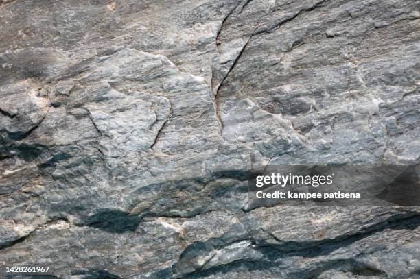 full frame shot of stone texture pattern - roc photos et images de collection