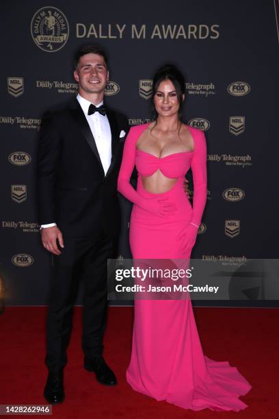 Lachlan Ilias of the Rabbitohs and his partner Regan Stephens arrive ahead of the 2022 Dally M Awards at The Winx Stand, Royal Randwick Racecourse on...