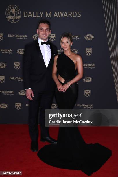 Cameron Murray of the Rabbitohs and his partner Miranda Cross arrive ahead of the 2022 Dally M Awards at The Winx Stand, Royal Randwick Racecourse on...