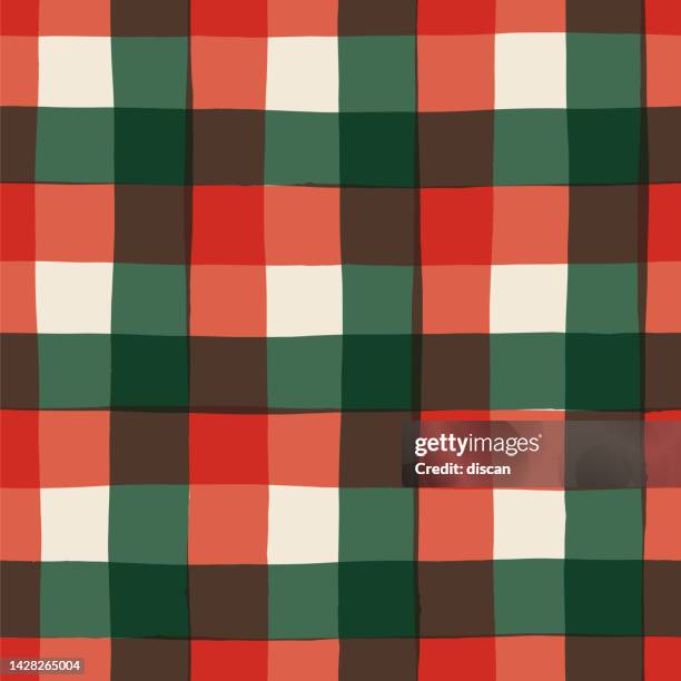 christmas tartan seamless pattern. - christmas tartan stock illustrations