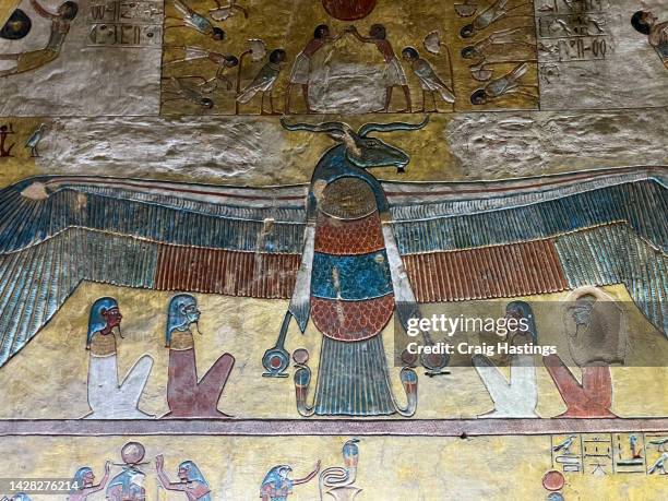 macro extreme close up of ancient egyptian hieroglyphs carvings on a tomb wall in luxor egypt. stone craved images of ancient gods and religion decorate the walls depicting life events and passage to the after life for the dead pharaoh. - ancient egyptian culture stock pictures, royalty-free photos & images