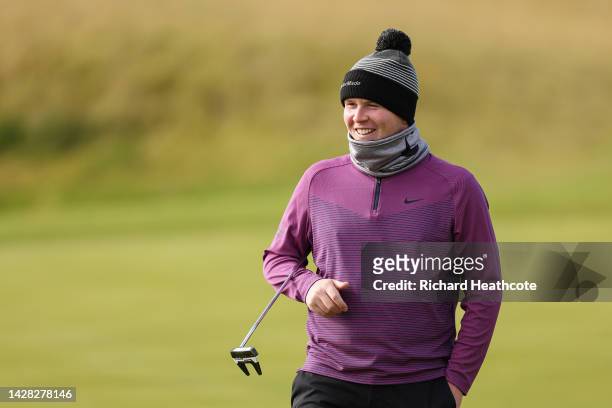 Robert MacIntyre of Scotland smiles during a practice round prior to the Alfred Dunhill Links Championship at Kingsbarns Golf Links on September 28,...