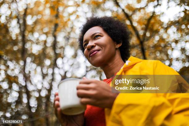 hiker drinking hot drink - tea outdoor stock pictures, royalty-free photos & images