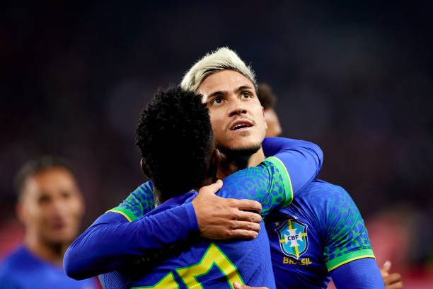 Pedro Guilherme Abreu dos Santos of Brazil celebrates after scoring their side's fifth goal with his teammate Vinicius Junior during the...