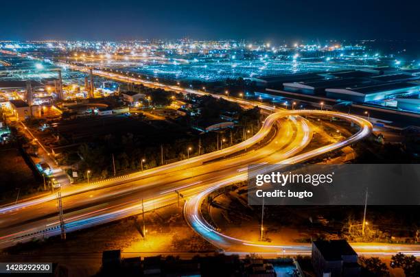 winding road at night time - chonburi province stock pictures, royalty-free photos & images