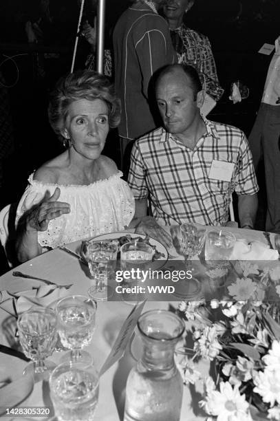 Nancy Reagan and Peter McCoy attend a party at Wexford, an estate rented by the Reagan family during Ronald Reagan's presidential campaign, in...