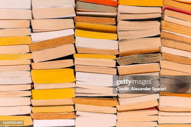 stack of old books, high angle view - paris library stock pictures, royalty-free photos & images