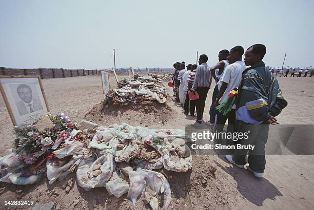 Fans pay their respects to the graves of the Zambian national football team members killed in an aircrash on 12th July 1993 in Heroes Acre outside...