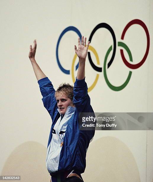 Kristin Otto of East Germany celebrates winning the Women's 100 metres Butterfly final on 23rd September 1988 during the XXIV Summer Olympic Games at...