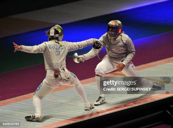 US Ibtihaj Muhammad fights with Italian Gioia Marzocca during the