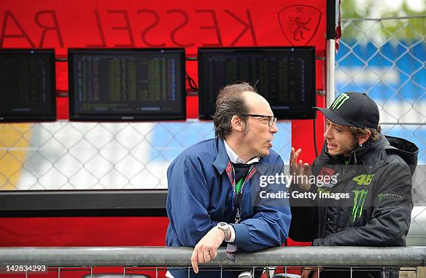 Valentino Rossi of team Team Kessel Racing - Ferrari 458 Italia speaks to journalist Guido Meda during the Blancpain GT Endurance test day one at...