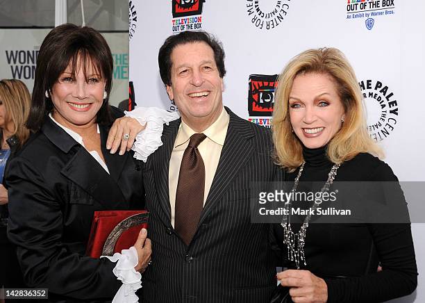 Actress Michele Lee, Warner Brother's Peter Roth and actress Donna Mills arrive at the Paley Center's opening of "Television: Out Of The Box" at The...