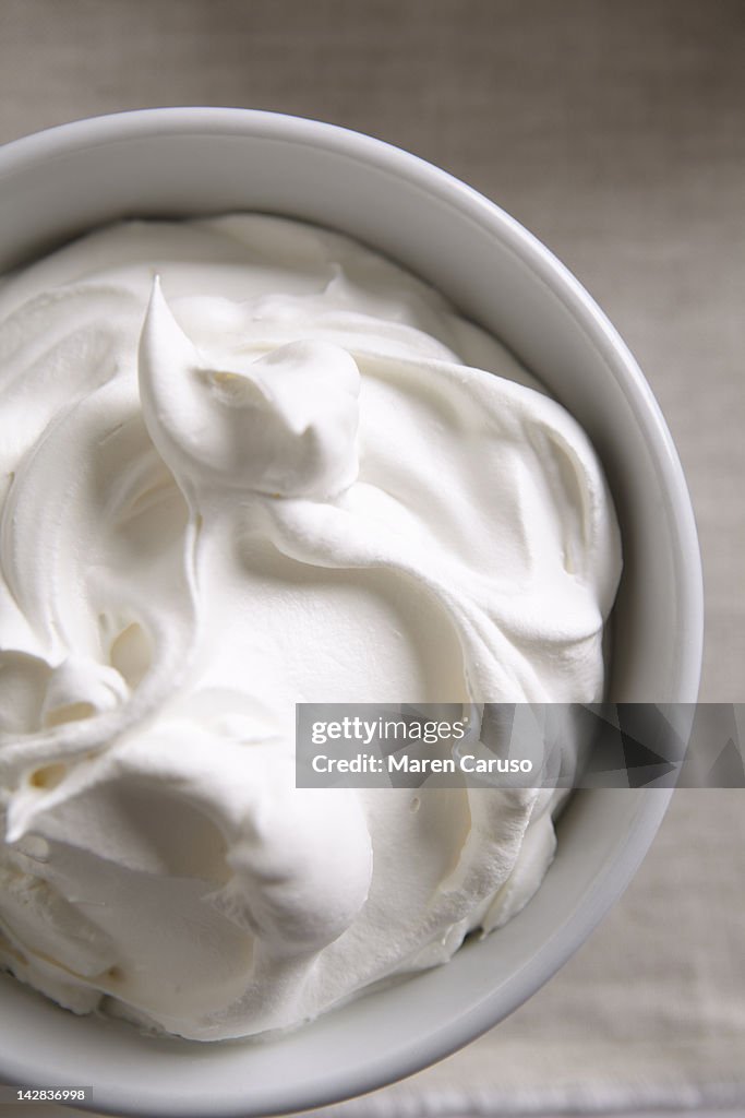 Overhead of a bowl of whipped cream