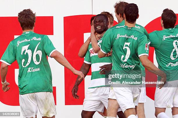 Gerald Asamoah of Fuerthcelebrates scoring the 2nd team goal with his team mates during the Second Bundesliga match between Greuther Fuerth and FC...