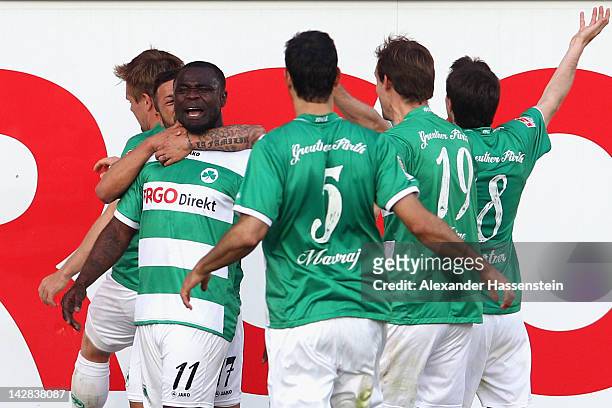 Gerald Asamoah of Fuerthcelebrates scoring the 2nd team goal with his team mates during the Second Bundesliga match between Greuther Fuerth and FC...