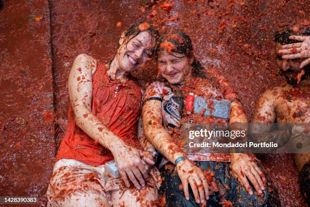 Participants in the festival La Tomatina, a tomato battle that is celebrated every year in the city of Bunol. It is the biggest food battle in the...