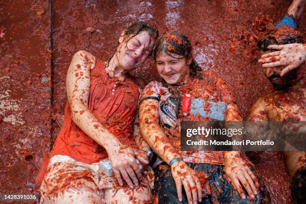 Participants in the festival La Tomatina, a tomato battle that is celebrated every year in the city of Bunol. It is the biggest food battle in the...