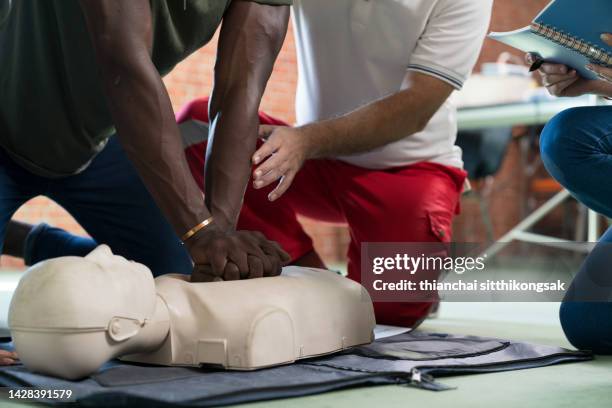 cpr training. - first aid class stock pictures, royalty-free photos & images