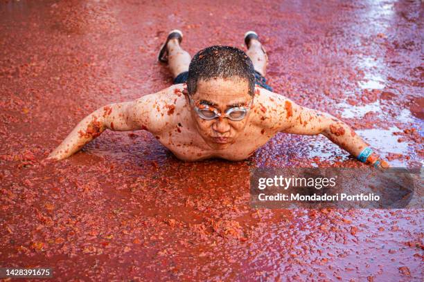 Participants in the festival La Tomatina, a tomato battle that is celebrated every year in the city of Bunol. It is the biggest food battle in the...