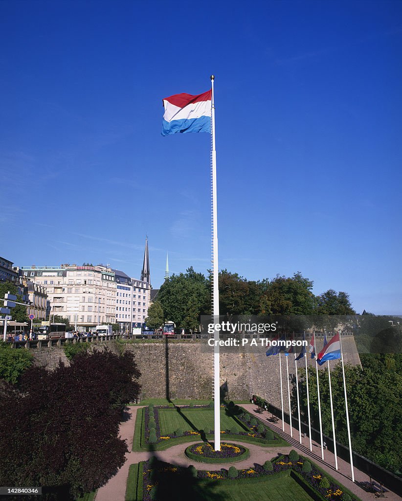 Luxembourg flag on tall flag pole, Luxembourg City, Luxembourg